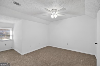 Lakefront Luxury Living with Stunning Views! This beautifully on Fairfield Plantation Golf and Country Club in Georgia - for sale on GolfHomes.com, golf home, golf lot