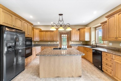 Enjoy golf course living in this spacious 4-bed, 3.5-bath on Ankeny Golf and Country Club in Iowa - for sale on GolfHomes.com, golf home, golf lot