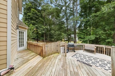 Tucked at the end of a quiet cul-de-sac and backing up to on Canongate At Eagle Watch Golf Club in Georgia - for sale on GolfHomes.com, golf home, golf lot