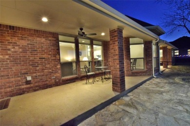 Rate takeoffs and landings from your back patio!  This lovely on Pecan Plantation Country Club in Texas - for sale on GolfHomes.com, golf home, golf lot