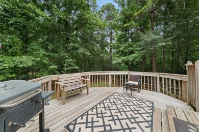 Tucked at the end of a quiet cul-de-sac and backing up to on Canongate At Eagle Watch Golf Club in Georgia - for sale on GolfHomes.com, golf home, golf lot
