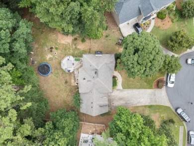 Tucked at the end of a quiet cul-de-sac and backing up to on Canongate At Eagle Watch Golf Club in Georgia - for sale on GolfHomes.com, golf home, golf lot