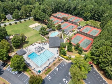Tucked at the end of a quiet cul-de-sac and backing up to on Canongate At Eagle Watch Golf Club in Georgia - for sale on GolfHomes.com, golf home, golf lot