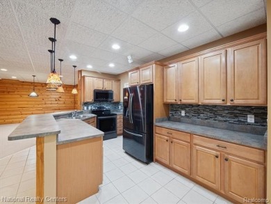 Absolutely Amazing home on the 13th & 14th fairways of Prestwick on Prestwick Village Golf Club in Michigan - for sale on GolfHomes.com, golf home, golf lot