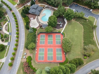 Tucked at the end of a quiet cul-de-sac and backing up to on Canongate At Eagle Watch Golf Club in Georgia - for sale on GolfHomes.com, golf home, golf lot