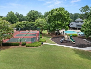 Tucked at the end of a quiet cul-de-sac and backing up to on Canongate At Eagle Watch Golf Club in Georgia - for sale on GolfHomes.com, golf home, golf lot