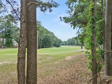 Tucked at the end of a quiet cul-de-sac and backing up to on Canongate At Eagle Watch Golf Club in Georgia - for sale on GolfHomes.com, golf home, golf lot