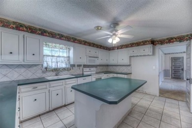 Discover the potential in this spacious 2-story ranch style home on The Canyons At Blackjack Ridge in Oklahoma - for sale on GolfHomes.com, golf home, golf lot