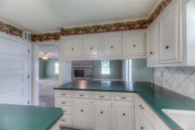 Discover the potential in this spacious 2-story ranch style home on The Canyons At Blackjack Ridge in Oklahoma - for sale on GolfHomes.com, golf home, golf lot