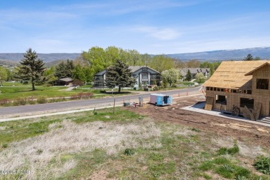 Discover the perfect balance of privacy and proximity with this on Homestead Golf Club and Resort in Utah - for sale on GolfHomes.com, golf home, golf lot
