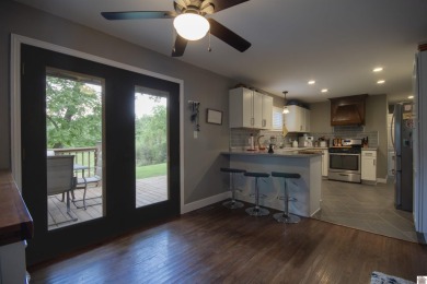 Charming, beautifully maintained 3-bedroom, 1.5-bath home is on Mayfield-Graves Country Club in Kentucky - for sale on GolfHomes.com, golf home, golf lot