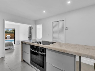 Experience luxury living in this fully remodeled golf course on Hollywood Beach Golf and Country Club in Florida - for sale on GolfHomes.com, golf home, golf lot