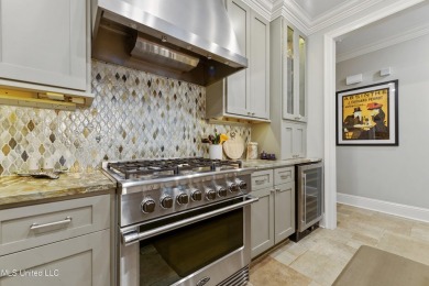 This exquisitely designed, custom-built residence features on The Bridges Golf Club At Hollywood Casino in Mississippi - for sale on GolfHomes.com, golf home, golf lot