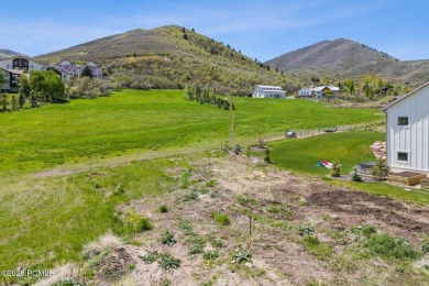 Discover the perfect balance of privacy and proximity with this on Homestead Golf Club and Resort in Utah - for sale on GolfHomes.com, golf home, golf lot