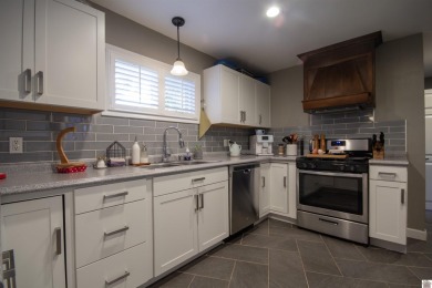 Charming, beautifully maintained 3-bedroom, 1.5-bath home is on Mayfield-Graves Country Club in Kentucky - for sale on GolfHomes.com, golf home, golf lot