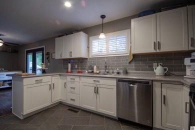 Charming, beautifully maintained 3-bedroom, 1.5-bath home is on Mayfield-Graves Country Club in Kentucky - for sale on GolfHomes.com, golf home, golf lot