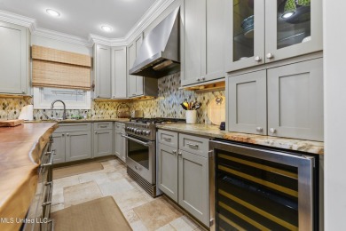 This exquisitely designed, custom-built residence features on The Bridges Golf Club At Hollywood Casino in Mississippi - for sale on GolfHomes.com, golf home, golf lot