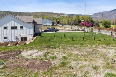 Discover the perfect balance of privacy and proximity with this on Homestead Golf Club and Resort in Utah - for sale on GolfHomes.com, golf home, golf lot