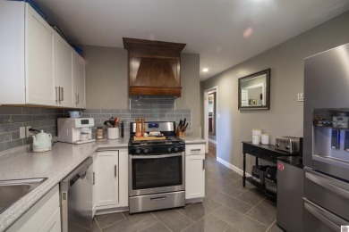 Charming, beautifully maintained 3-bedroom, 1.5-bath home is on Mayfield-Graves Country Club in Kentucky - for sale on GolfHomes.com, golf home, golf lot