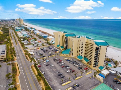 Indulge in your own oasis with this adorable beachfront condo on Signal Hill Golf Course, Inc. in Florida - for sale on GolfHomes.com, golf home, golf lot