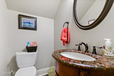 This exquisitely designed, custom-built residence features on The Bridges Golf Club At Hollywood Casino in Mississippi - for sale on GolfHomes.com, golf home, golf lot