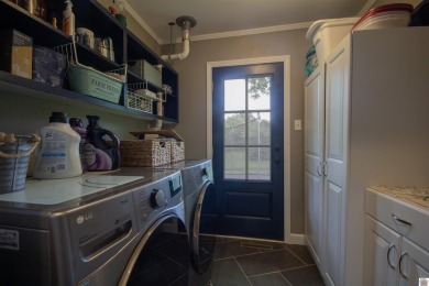 Charming, beautifully maintained 3-bedroom, 1.5-bath home is on Mayfield-Graves Country Club in Kentucky - for sale on GolfHomes.com, golf home, golf lot
