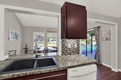 NOW FEATURING A BRAND NEW ROOF! Picture yourself on the on The Ridge Manor Oaks Golf and Country Club in Florida - for sale on GolfHomes.com, golf home, golf lot