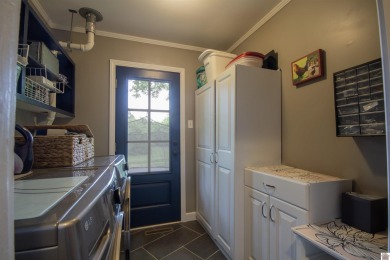 Charming, beautifully maintained 3-bedroom, 1.5-bath home is on Mayfield-Graves Country Club in Kentucky - for sale on GolfHomes.com, golf home, golf lot