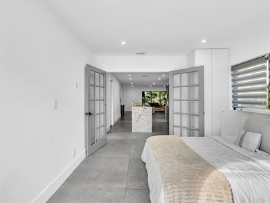 Experience luxury living in this fully remodeled golf course on Hollywood Beach Golf and Country Club in Florida - for sale on GolfHomes.com, golf home, golf lot