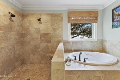 This exquisitely designed, custom-built residence features on The Bridges Golf Club At Hollywood Casino in Mississippi - for sale on GolfHomes.com, golf home, golf lot