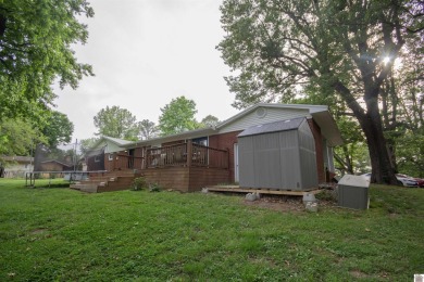 Charming, beautifully maintained 3-bedroom, 1.5-bath home is on Mayfield-Graves Country Club in Kentucky - for sale on GolfHomes.com, golf home, golf lot