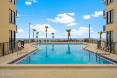 Indulge in your own oasis with this adorable beachfront condo on Signal Hill Golf Course, Inc. in Florida - for sale on GolfHomes.com, golf home, golf lot