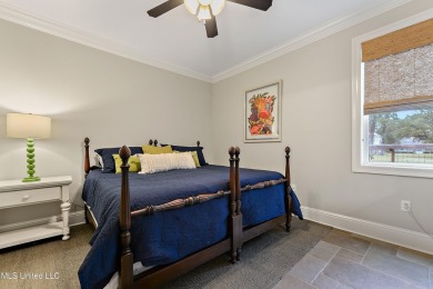 This exquisitely designed, custom-built residence features on The Bridges Golf Club At Hollywood Casino in Mississippi - for sale on GolfHomes.com, golf home, golf lot