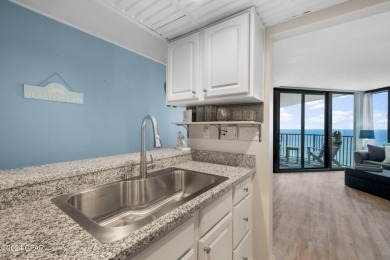 Indulge in your own oasis with this adorable beachfront condo on Signal Hill Golf Course, Inc. in Florida - for sale on GolfHomes.com, golf home, golf lot