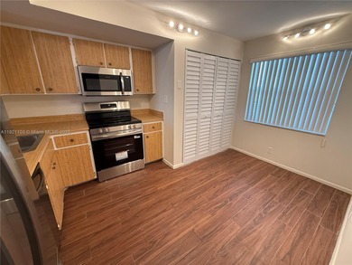 THIS BEAUTIFUL TWO BEDROOM TWO BATH CORNER UNIT, SPLIT BED ROOMS on Oriole Golf and Tennis Club in Florida - for sale on GolfHomes.com, golf home, golf lot