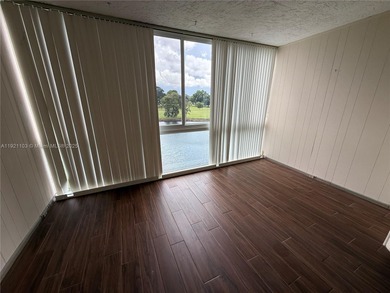 THIS BEAUTIFUL TWO BEDROOM TWO BATH CORNER UNIT, SPLIT BED ROOMS on Oriole Golf and Tennis Club in Florida - for sale on GolfHomes.com, golf home, golf lot