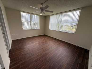 THIS BEAUTIFUL TWO BEDROOM TWO BATH CORNER UNIT, SPLIT BED ROOMS on Oriole Golf and Tennis Club in Florida - for sale on GolfHomes.com, golf home, golf lot