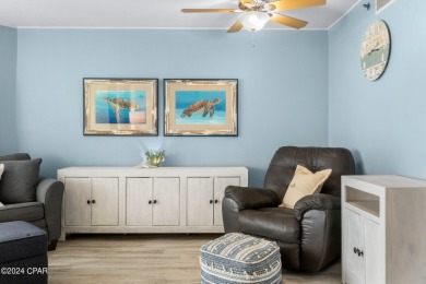 Indulge in your own oasis with this adorable beachfront condo on Signal Hill Golf Course, Inc. in Florida - for sale on GolfHomes.com, golf home, golf lot