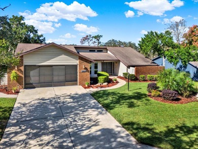 NOW FEATURING A BRAND NEW ROOF! Picture yourself on the on The Ridge Manor Oaks Golf and Country Club in Florida - for sale on GolfHomes.com, golf home, golf lot