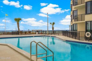 Indulge in your own oasis with this adorable beachfront condo on Signal Hill Golf Course, Inc. in Florida - for sale on GolfHomes.com, golf home, golf lot