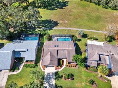 NOW FEATURING A BRAND NEW ROOF! Picture yourself on the on The Ridge Manor Oaks Golf and Country Club in Florida - for sale on GolfHomes.com, golf home, golf lot