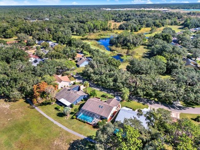 NOW FEATURING A BRAND NEW ROOF! Picture yourself on the on The Ridge Manor Oaks Golf and Country Club in Florida - for sale on GolfHomes.com, golf home, golf lot