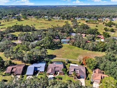 NOW FEATURING A BRAND NEW ROOF! Picture yourself on the on The Ridge Manor Oaks Golf and Country Club in Florida - for sale on GolfHomes.com, golf home, golf lot