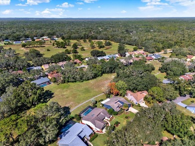 NOW FEATURING A BRAND NEW ROOF! Picture yourself on the on The Ridge Manor Oaks Golf and Country Club in Florida - for sale on GolfHomes.com, golf home, golf lot