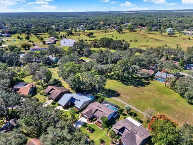 NOW FEATURING A BRAND NEW ROOF! Picture yourself on the on The Ridge Manor Oaks Golf and Country Club in Florida - for sale on GolfHomes.com, golf home, golf lot