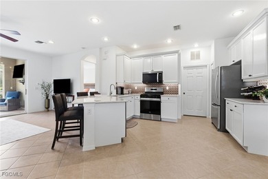 WOW! Take a look at this LOVELY attached villa pool home, with a on Pelican Preserve Golf Club in Florida - for sale on GolfHomes.com, golf home, golf lot