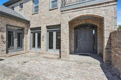 Welcome to this exquisite two-story home located in a cul-de-sac on English Turn Golf and Country Club in Louisiana - for sale on GolfHomes.com, golf home, golf lot