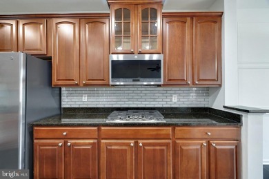 This Generous Town Home boasts over 3300 square feet of living on Lake Presidential Golf Club in Maryland - for sale on GolfHomes.com, golf home, golf lot