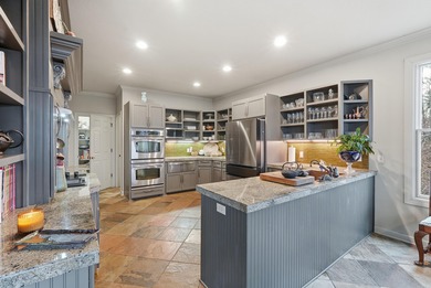 Southern charm meets modern comfort in this beautifully designed on Granada Golf Course in Arkansas - for sale on GolfHomes.com, golf home, golf lot