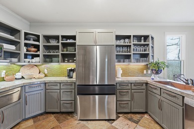 Southern charm meets modern comfort in this beautifully designed on Granada Golf Course in Arkansas - for sale on GolfHomes.com, golf home, golf lot